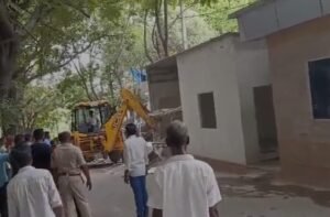 Demolition of illegal structures in lotus pond
